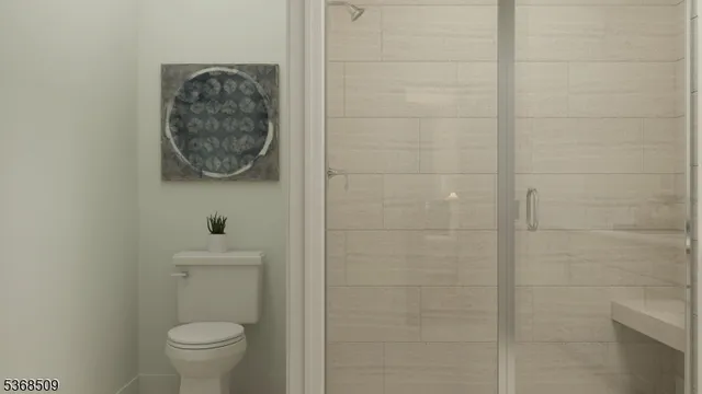 a bathroom with a toilet and a sink