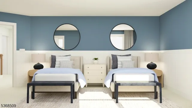 a bathroom with a toilet sink vanity tub and mirror