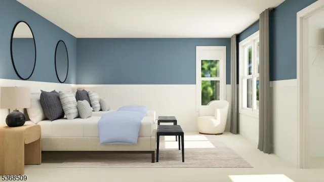 a living room with a couch and a potted plant