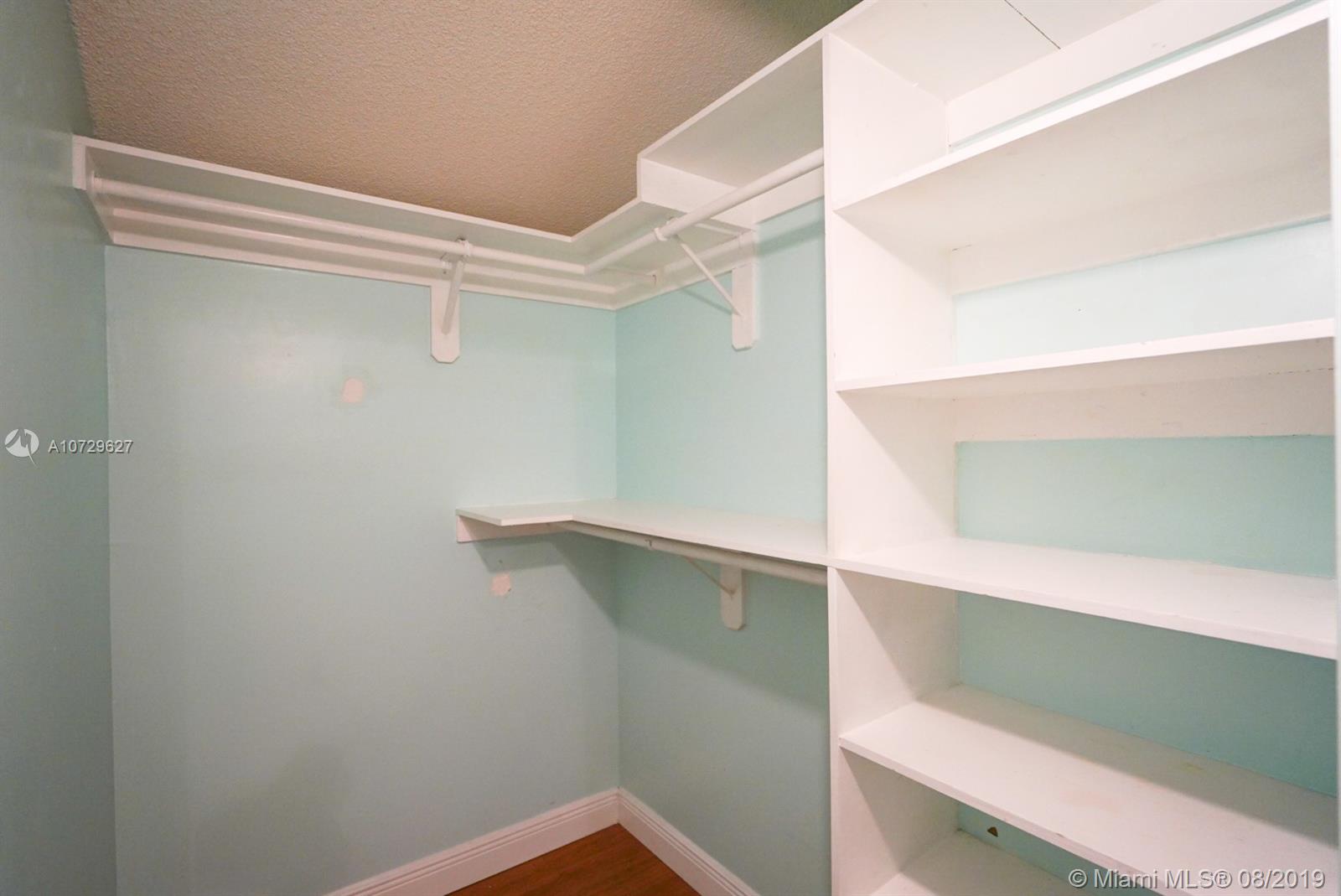 11501 Southwest 109th Road, Unit 13D Miami, FL 33176 - Photo 12 of 30 Bedroom 1 Walk-in Closet - Rods, Shelving, very spacious