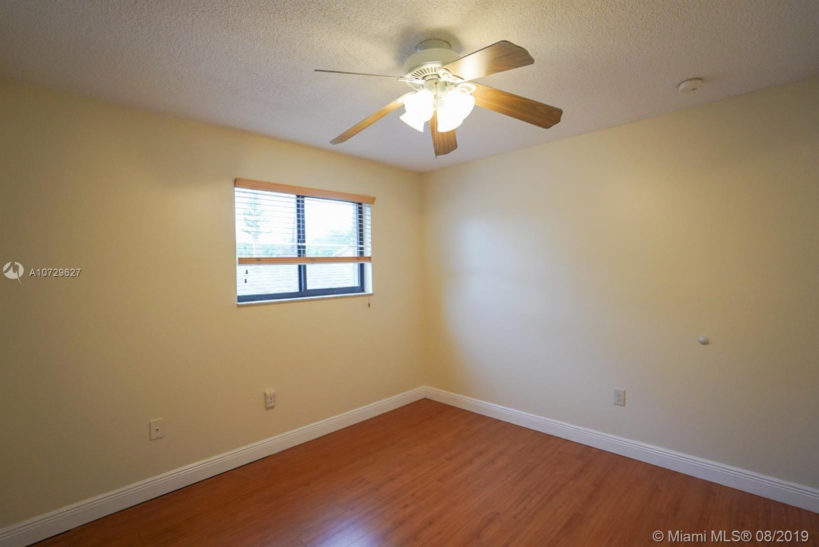 11501 Southwest 109th Road, Unit 13D Miami, FL 33176 - Photo 13 of 30 Bedroom 2 - Ceiling Fan, Window