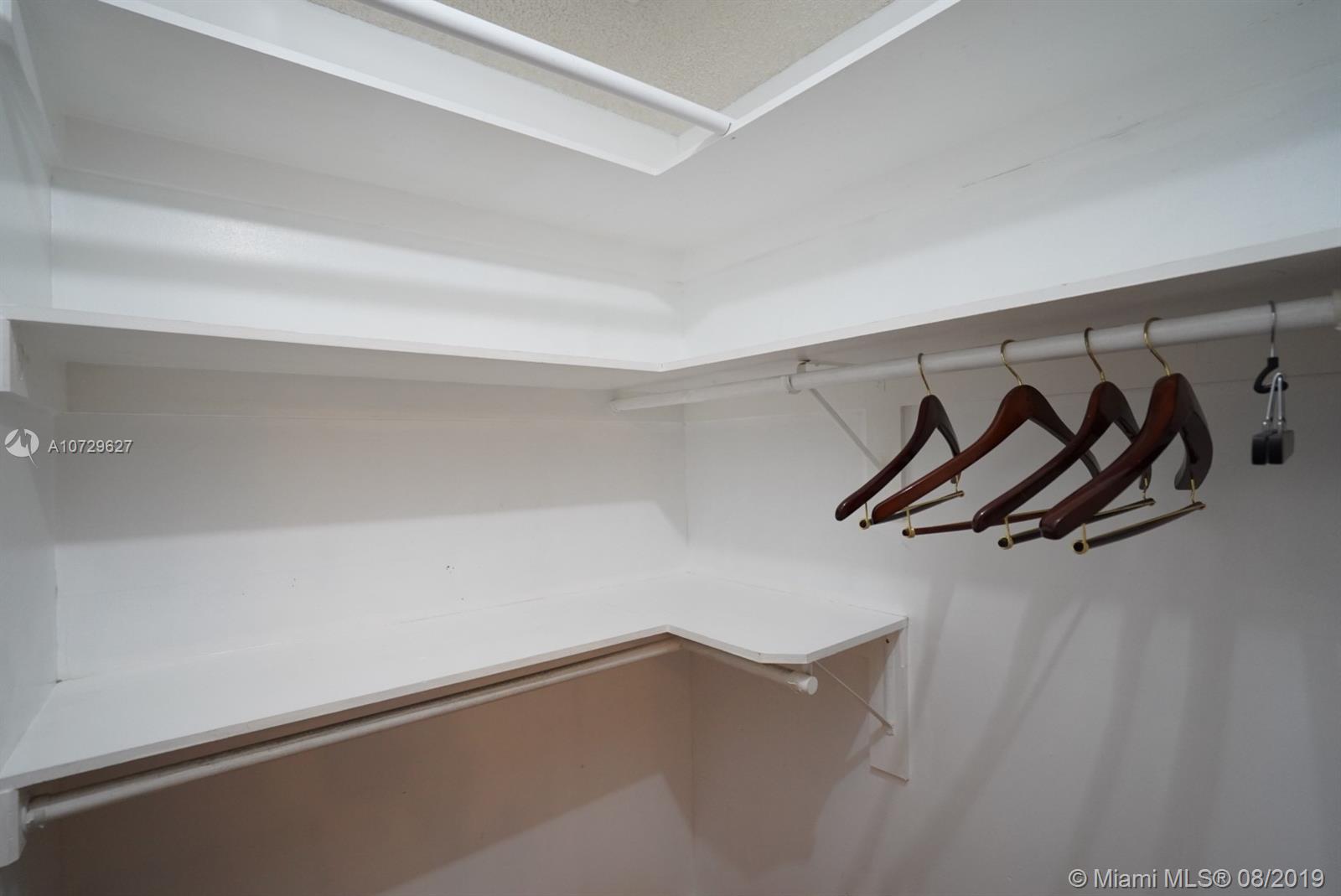 11501 Southwest 109th Road, Unit 13D Miami, FL 33176 - Photo 14 of 30 Bedroom 2 - Walk-in Closet