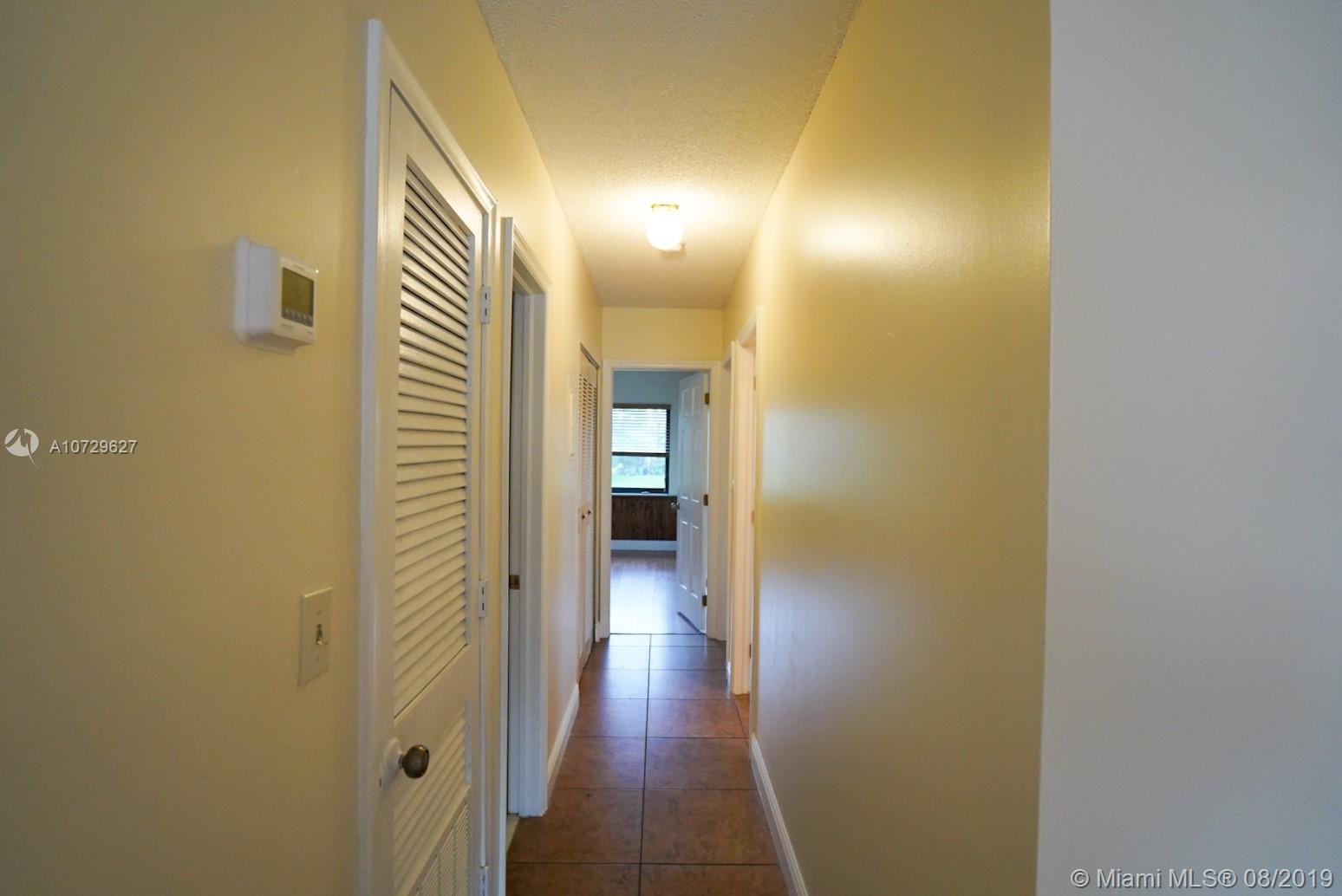 11501 Southwest 109th Road, Unit 13D Miami, FL 33176 - Photo 15 of 30 Hallway