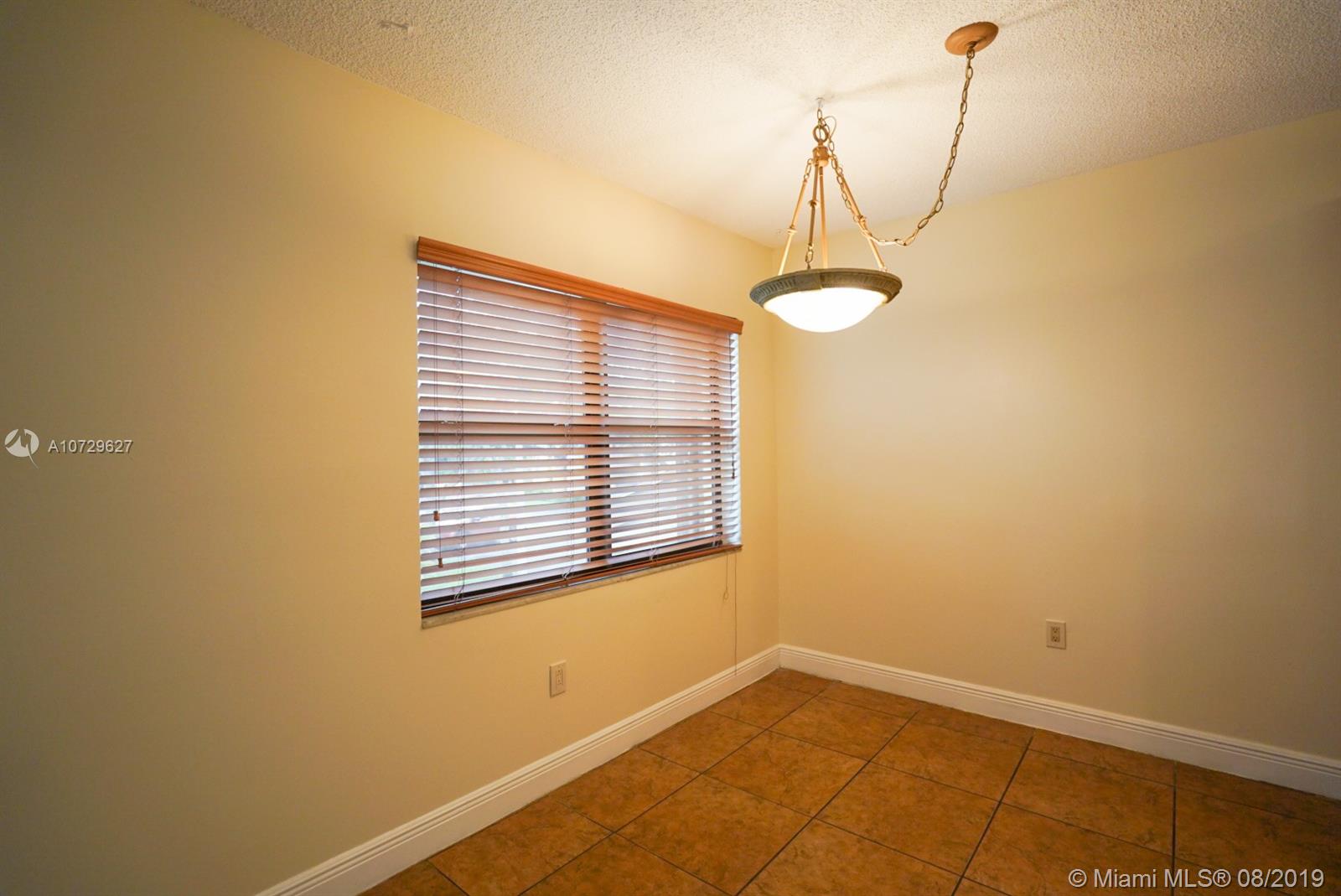 11501 Southwest 109th Road, Unit 13D Miami, FL 33176 - Photo 5 of 30 Dining Area with Window View