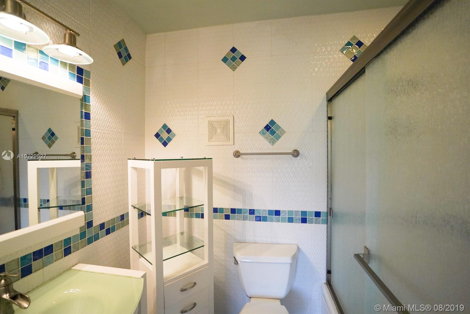 11501 Southwest 109th Road, Unit 13D Miami, FL 33176 - Photo 9 of 30 Master Bath - Jet Tub/Shower; updated vanity; updated toilet and lighting