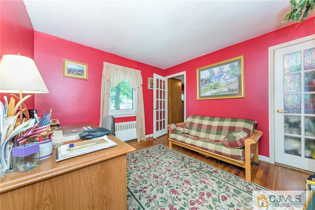138 River Edge Road Bergenfield, NJ 07621 - Photo 18 of 28 a bedroom with a bed and a dresser