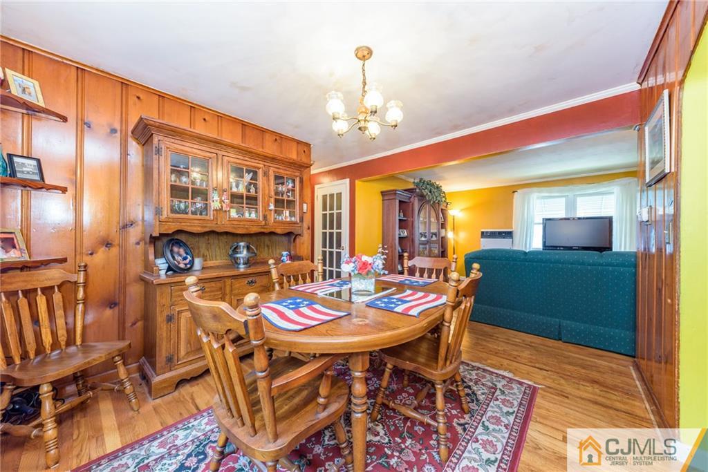 138 River Edge Road Bergenfield, NJ 07621 - Photo 8 of 28 a view of a dining room with furniture
