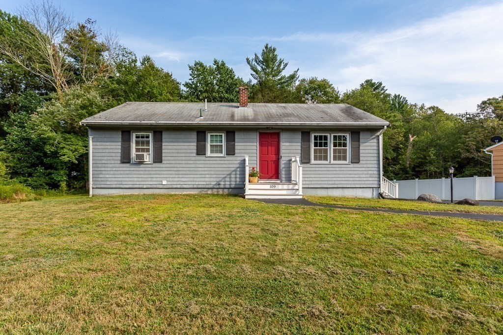 109 Oak Street Raynham, MA 02767 - Photo 2 of 25 a front view of a house with a yard