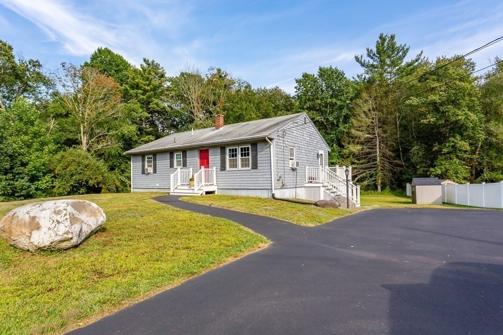 109 Oak Street Raynham, MA 02767 - Photo 25 of 25 a view of a house with pool and sitting area