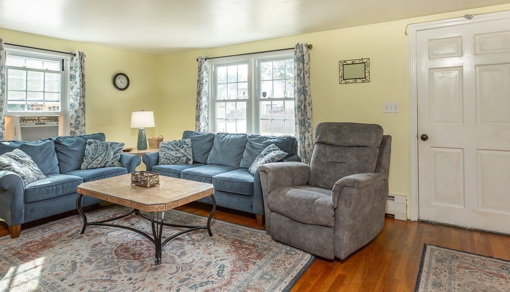 109 Oak Street Raynham, MA 02767 - Photo 10 of 25 a living room with furniture and a window