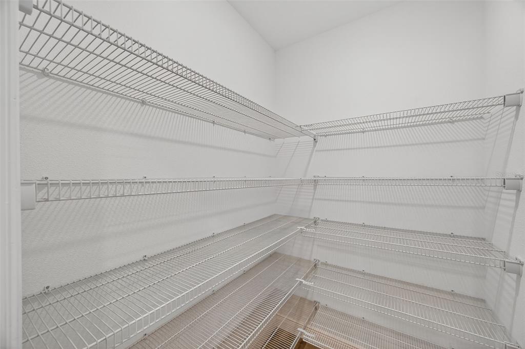 94 Rose Bud Ln Spring Hill Spring Hill, FL 34609 - Photo 11 of 38 a view of a closet