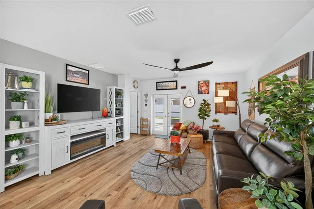 a bedroom with a bed and a cabinets