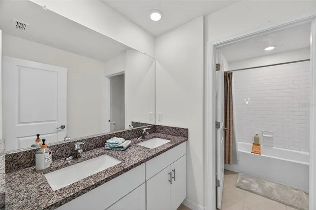 a picture of a hallway with white wall