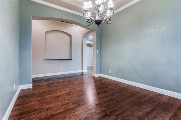 a view of a green field with clear sky