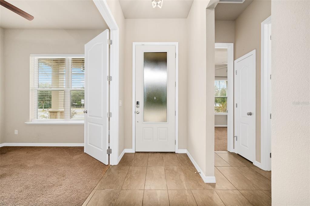 2779 Southwest 121st Drive Gainesville, FL 32608 - Photo 4 of 39 an empty room with windows and closet