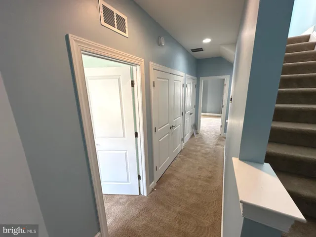 a view of a room with stairs