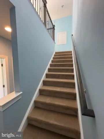 a view of balcony with furniture