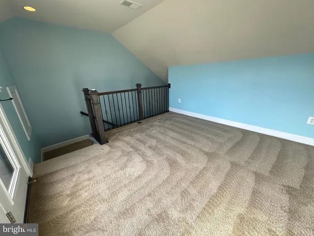 a view of a room with rack on the wall