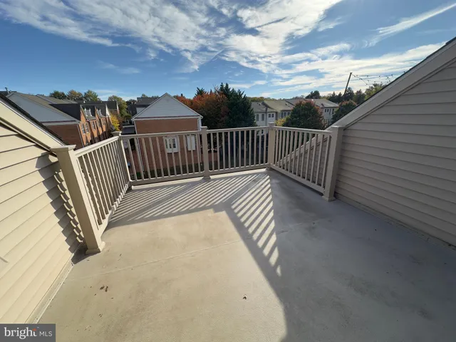a view of a street with a yard