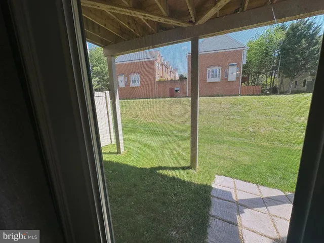 a view of a backyard of the house