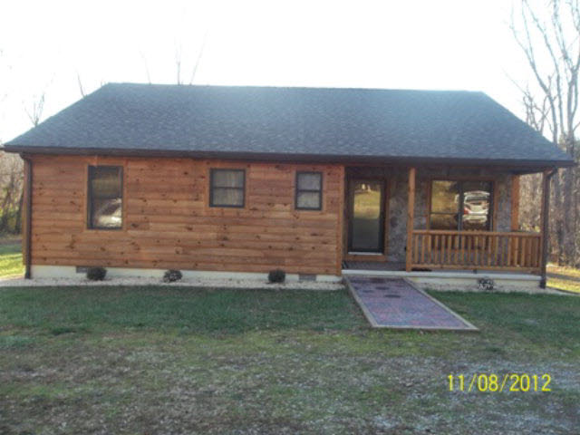 525 River Valley Road Rileyville, VA 22650 - Photo 3 of 14 a front view of a house with a yard