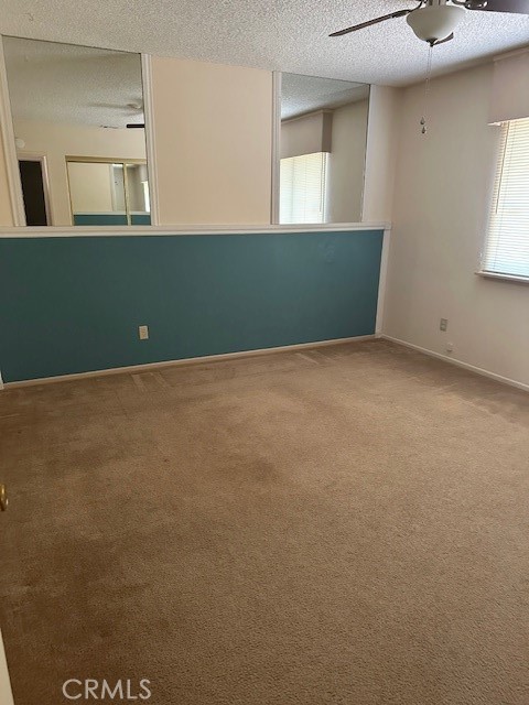 14966 Ritter Street, Unit D Victorville, CA 92394 - Photo 4 of 6 a view of an empty room and window