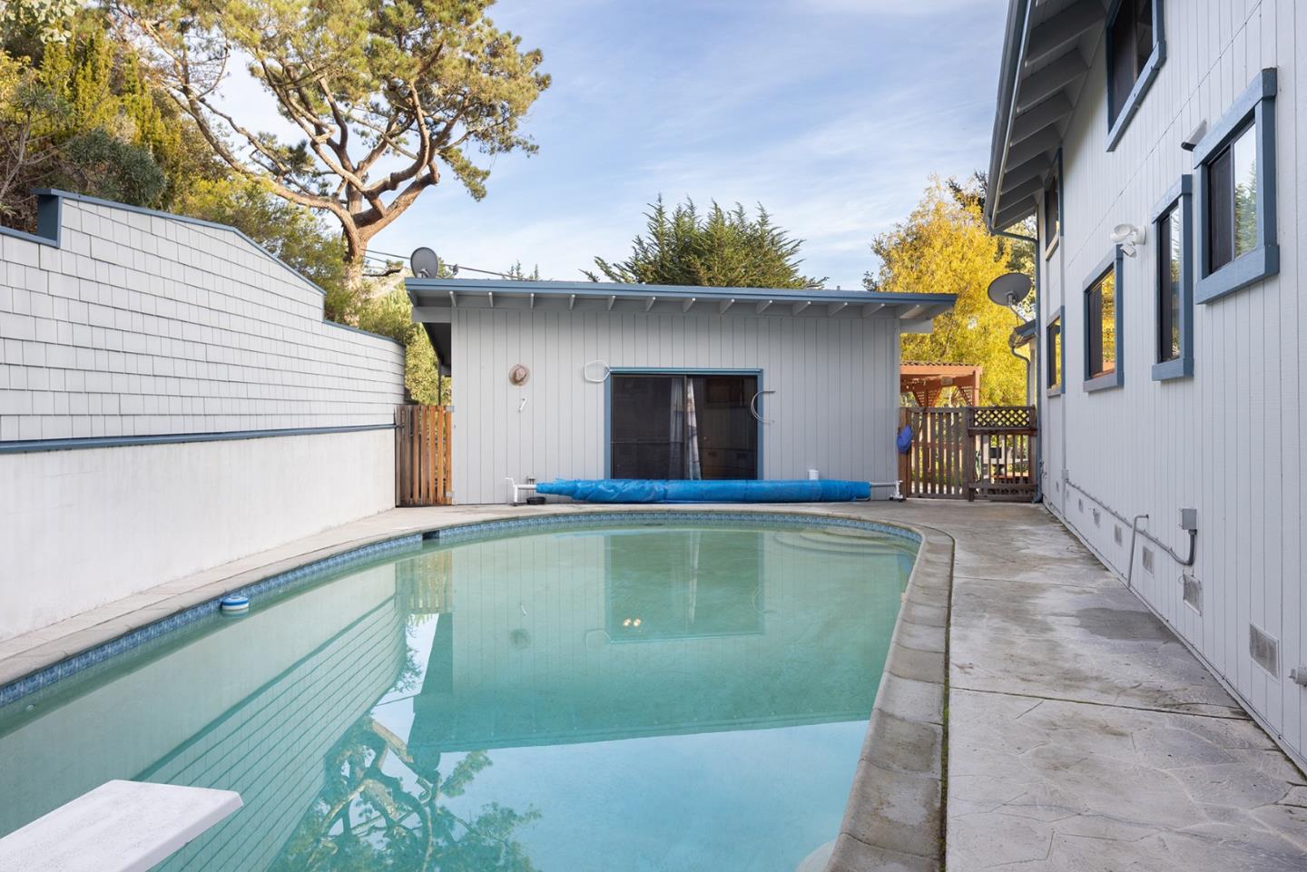 530 Quail Run Road Aptos, CA 95003 - Photo 19 of 25 a view of a house with pool and a yard