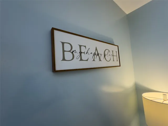 a wall with a signage