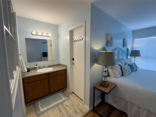 a view of bathroom with dual sinks