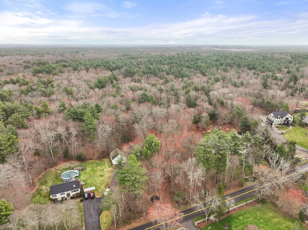an aerial view of a houses with outdoor space