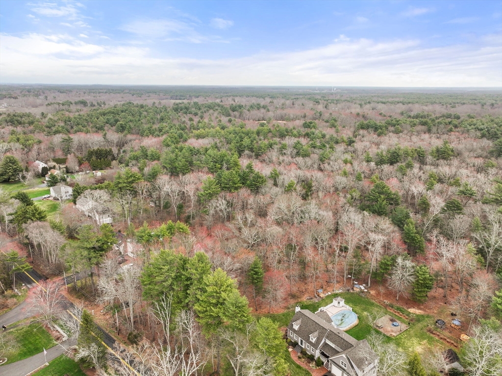 Off Vernon Street Middleboro, MA 02346 - Photo 2 of 11 a view of a city with lush green forest