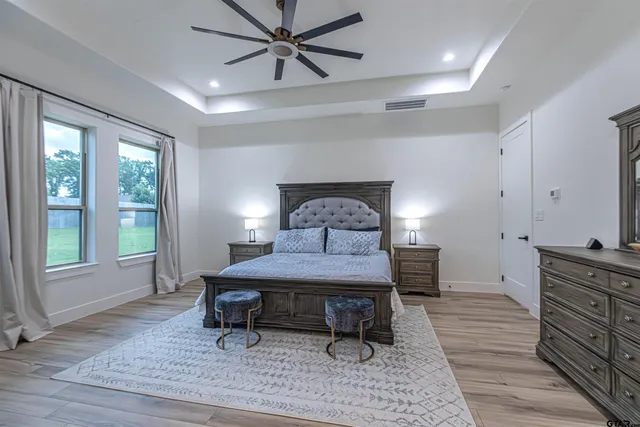 a bed room with a bed and a window