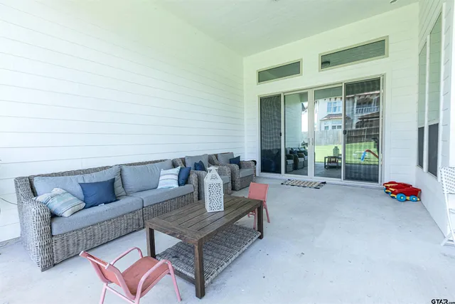 a outdoor living space with furniture and garden view
