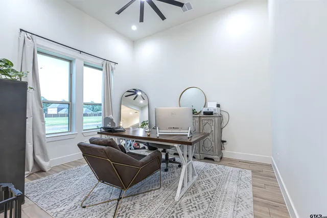a view of a livingroom with furniture