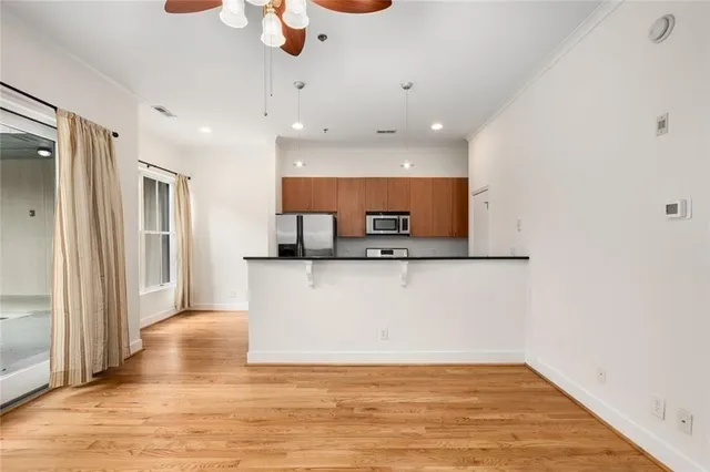 a picture of a bench in front of a wall