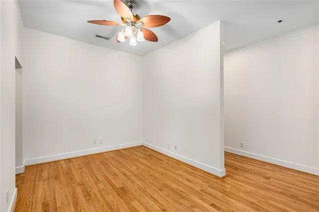 a room with gym equipment and a flat screen tv