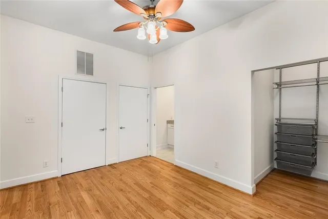 a living room with fireplace furniture and a flat screen tv