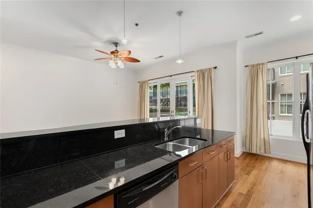 a bathroom with a shower and a bath tub