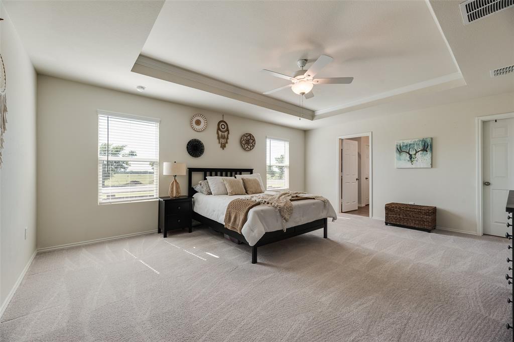 7005 Adderly Road Pilot Point, TX 76258 - Photo 18 of 38 Oversized primary bedroom
