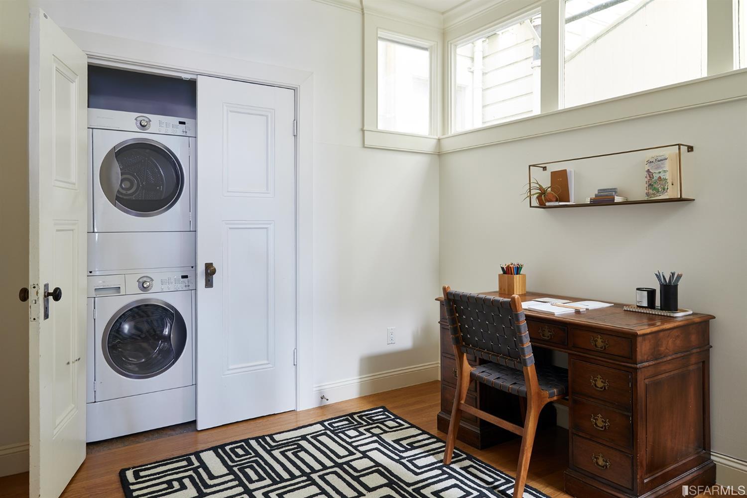2444 Broadway San Francisco, CA 94115 - Photo 28 of 57 a view of a storage and utility room with a washer and dryer