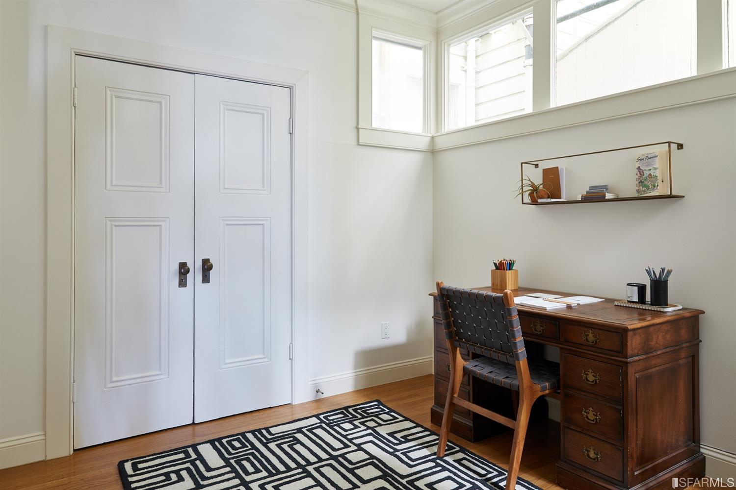 2444 Broadway San Francisco, CA 94115 - Photo 29 of 57 a view of a workspace with furniture and a window