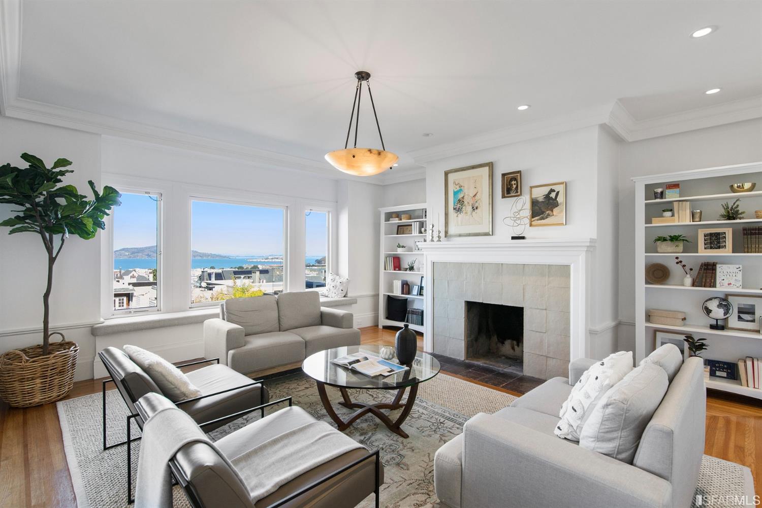 2444 Broadway San Francisco, CA 94115 - Photo 3 of 57 a living room with furniture and a fireplace