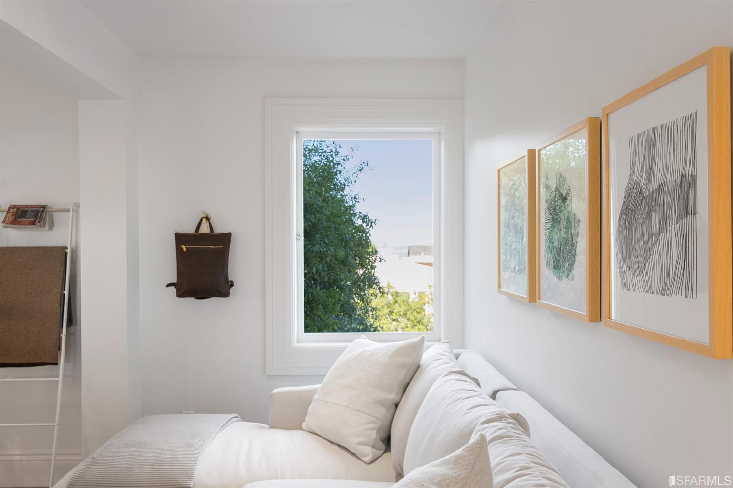 2444 Broadway San Francisco, CA 94115 - Photo 36 of 57 a living room with furniture and a window