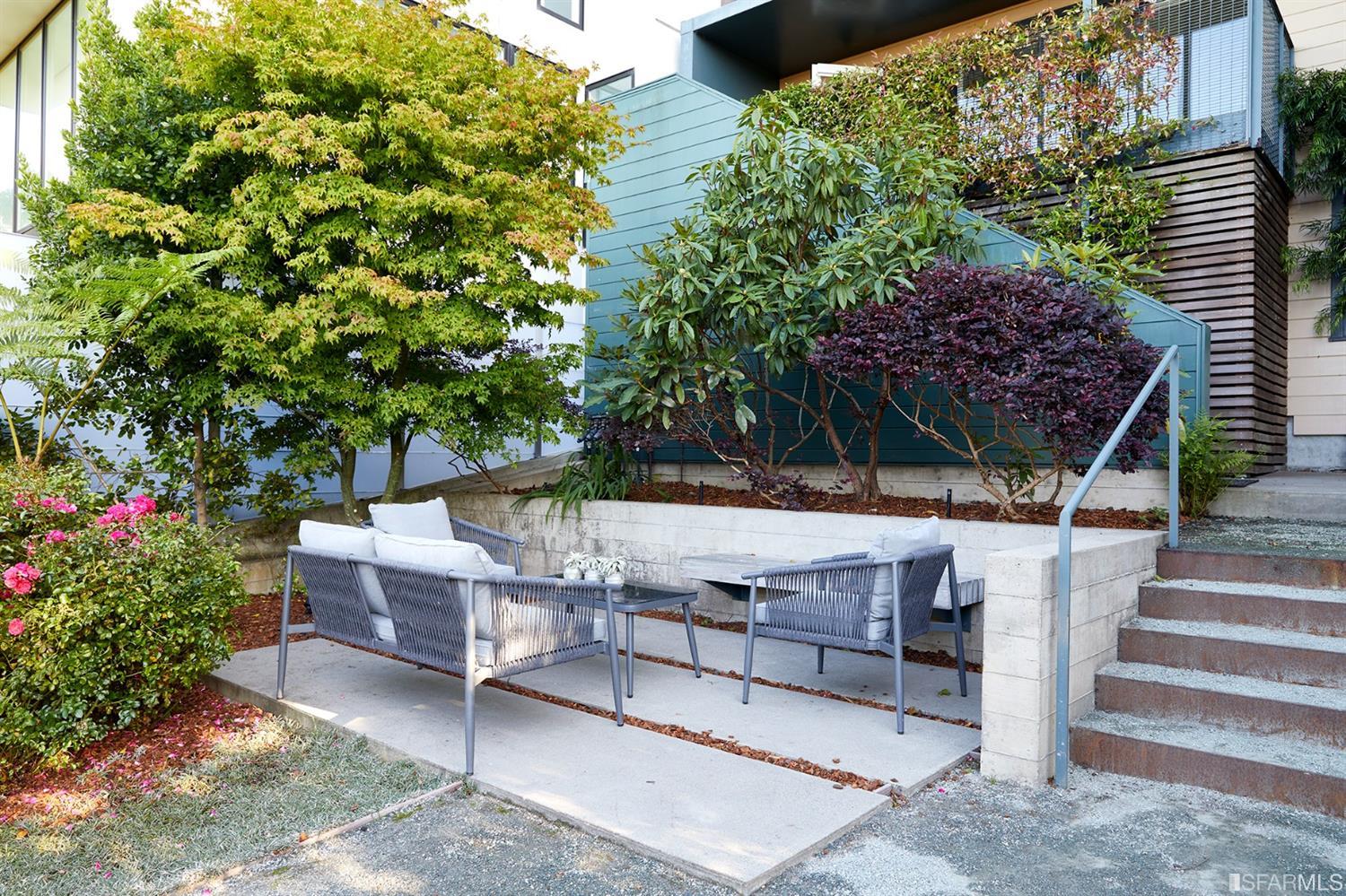 2444 Broadway San Francisco, CA 94115 - Photo 43 of 57 a backyard of a house with table and chairs