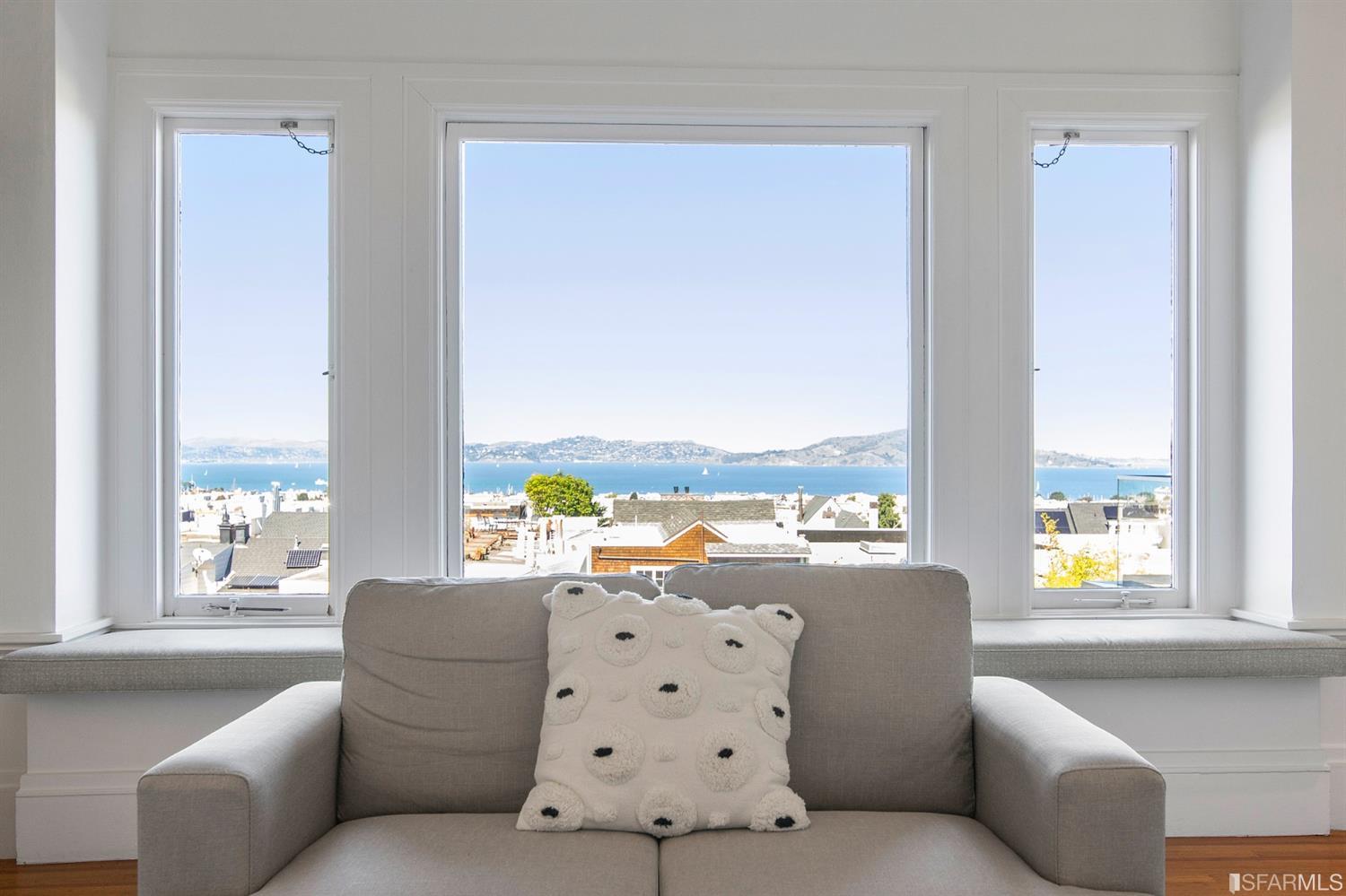 2444 Broadway San Francisco, CA 94115 - Photo 5 of 57 a living room with furniture and floor to ceiling windows