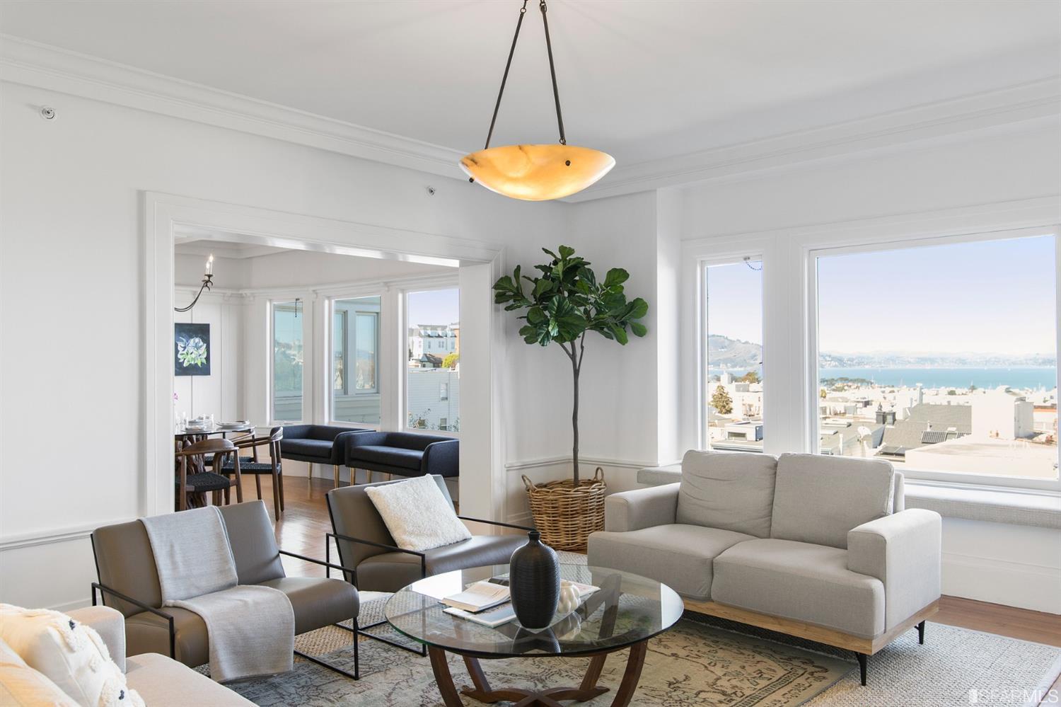 2444 Broadway San Francisco, CA 94115 - Photo 8 of 57 a living room with furniture and a large window