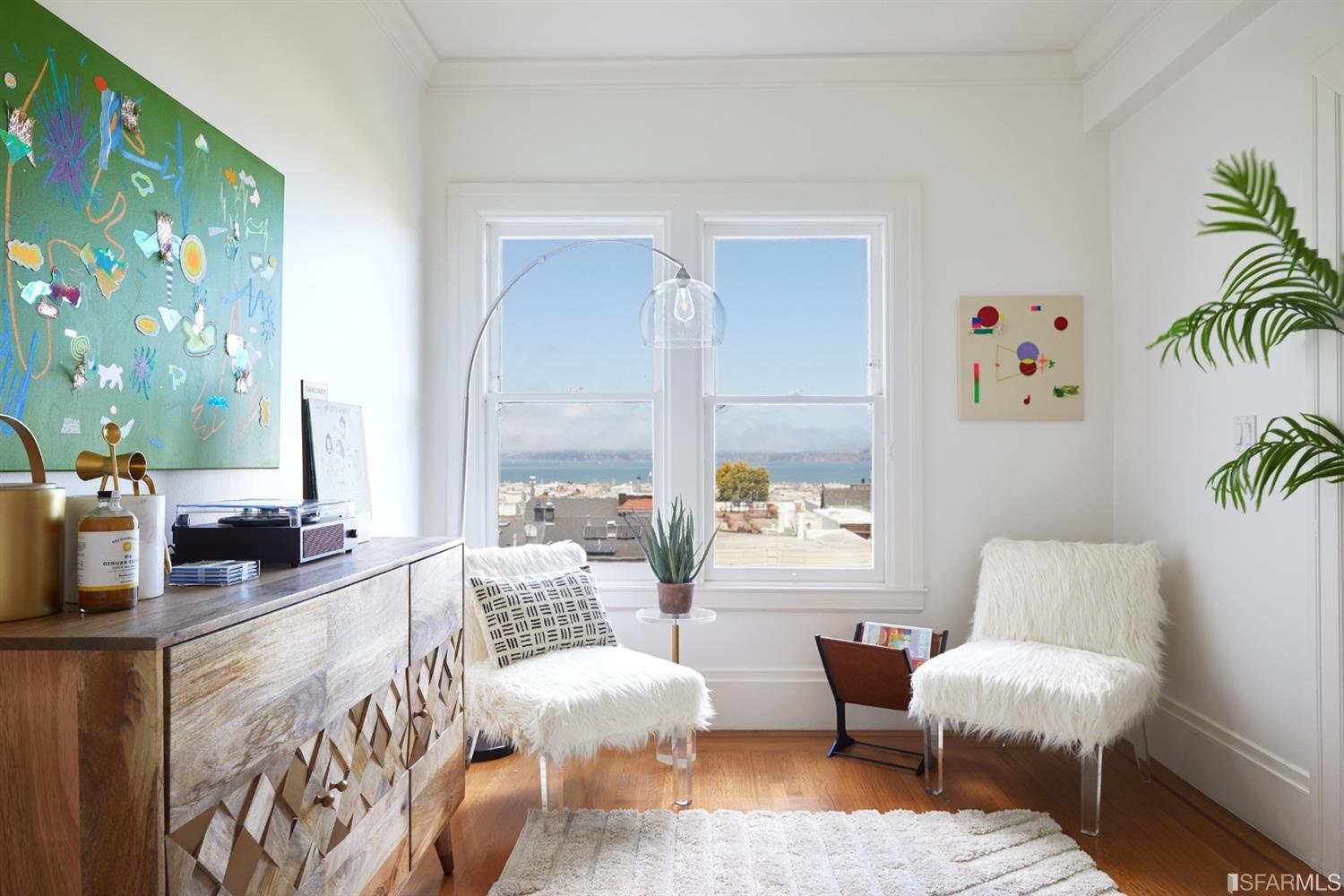 2444 Broadway San Francisco, CA 94115 - Photo 9 of 57 a living room with furniture and painting on the wall