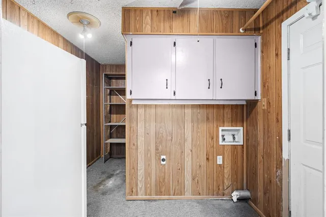a view of cabinets and wooden floor