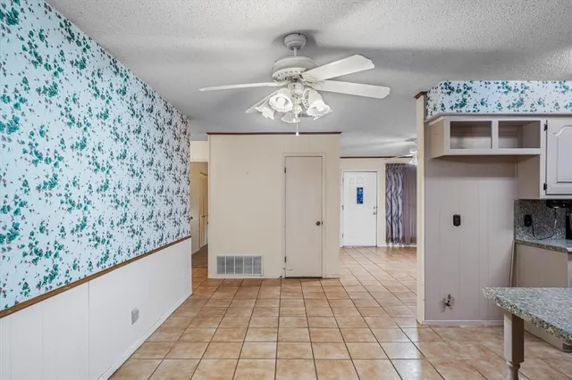 a view of entryway with kitchen