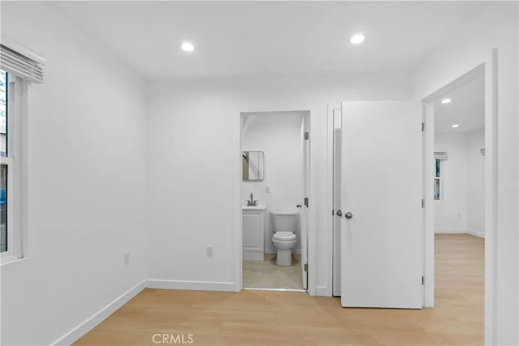 10112 Fernglen Avenue Tujunga, CA 91042 - Photo 6 of 12 a bathroom with a sink and a toilet